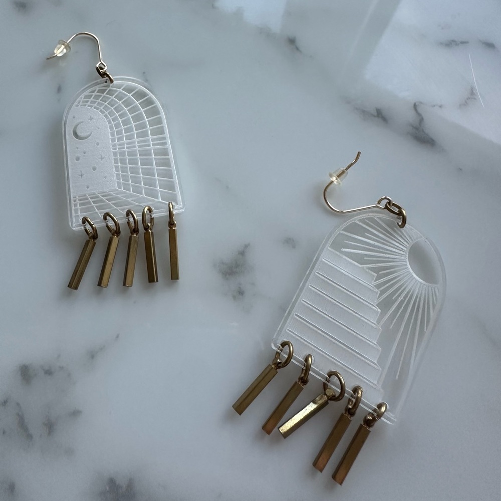 Acetate sun and moon portal earrings from local artist